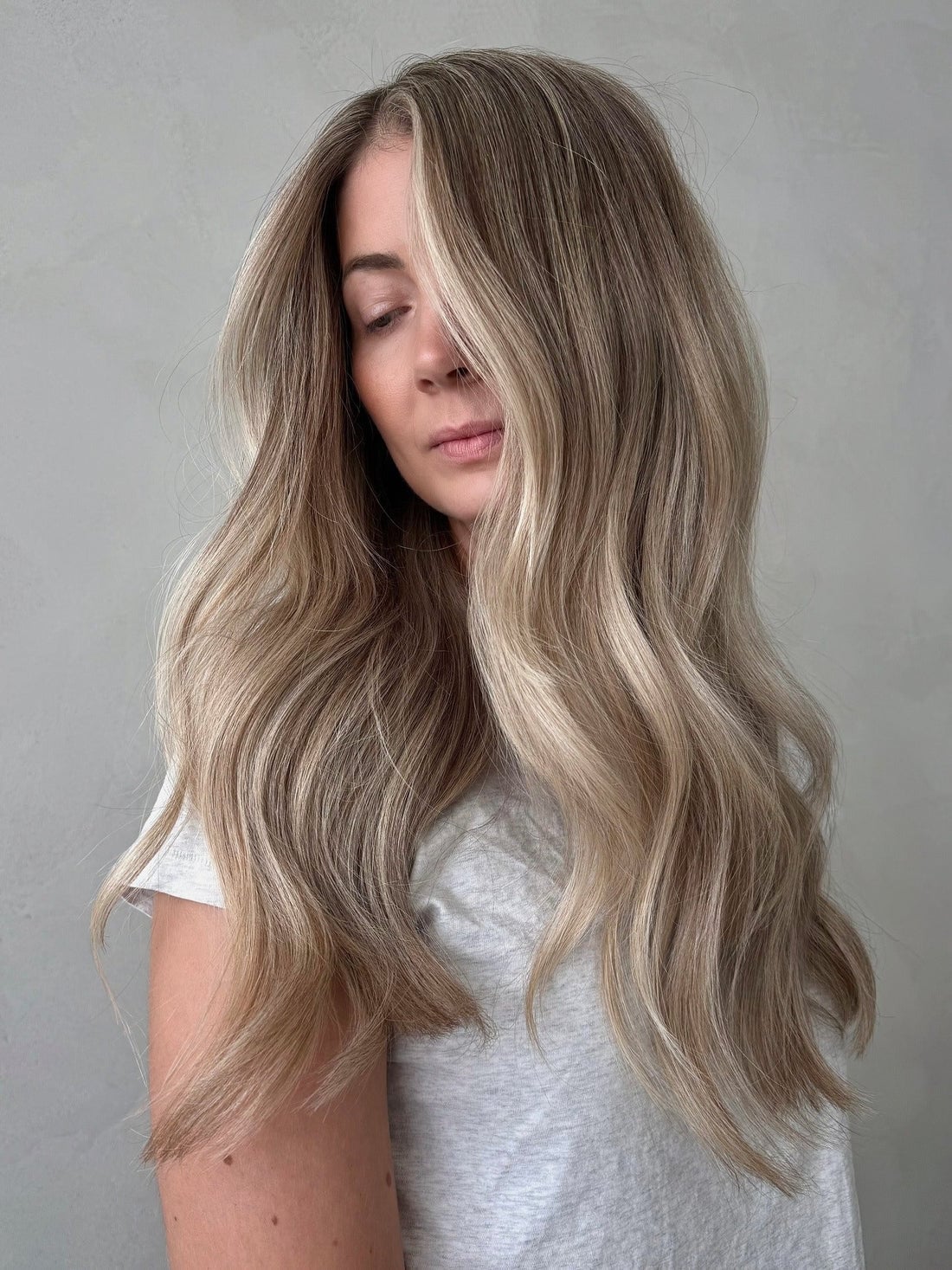 Soft Champagne Blonde Highlights On Long Wavy Hair Soft Champagne Blonde Highlights On Long Wavy Hair — Classy Blonde Highlights