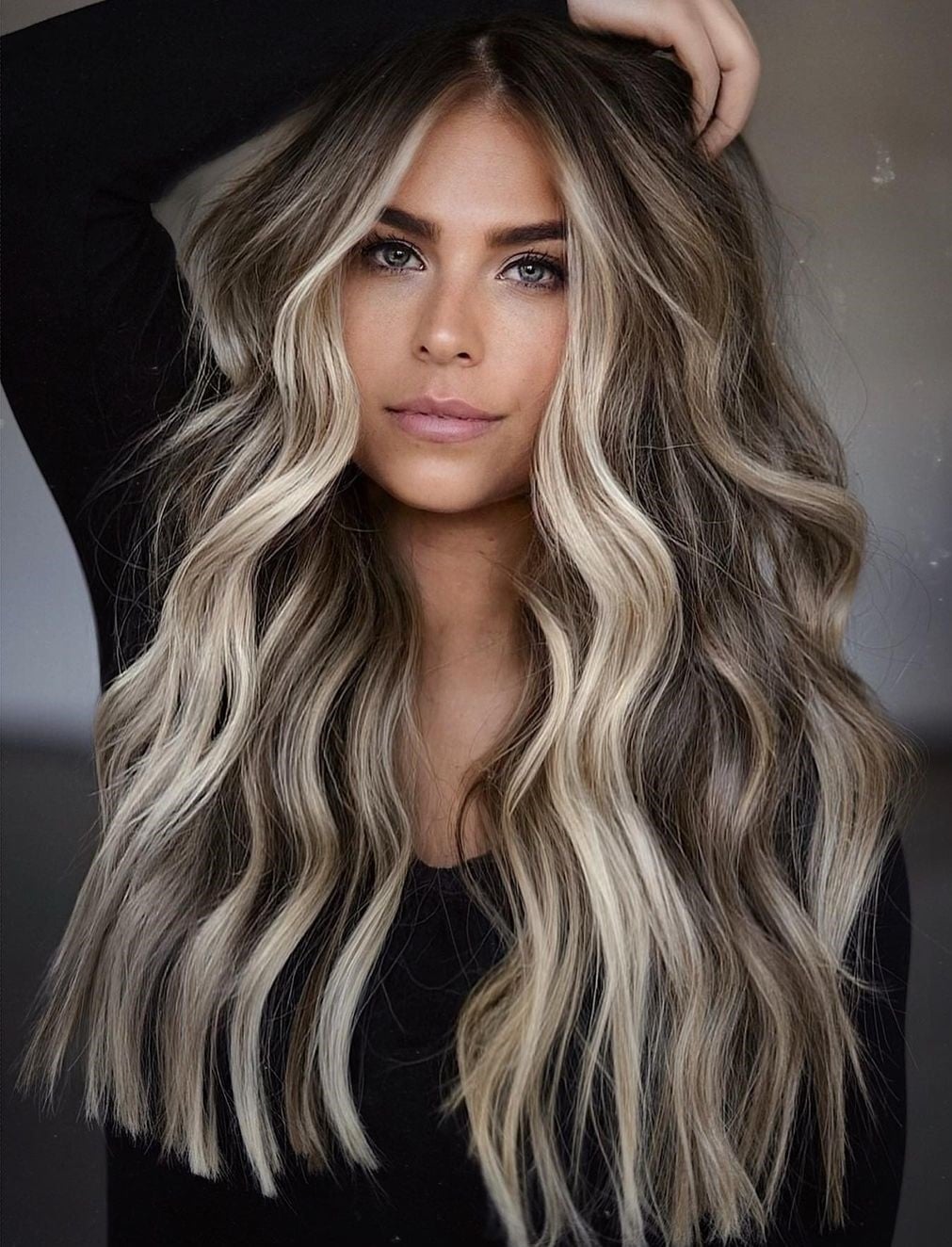 Mid-Back Length With Voluminous Blonde Highlights — Classy Blonde Highlights on Dark Hair
