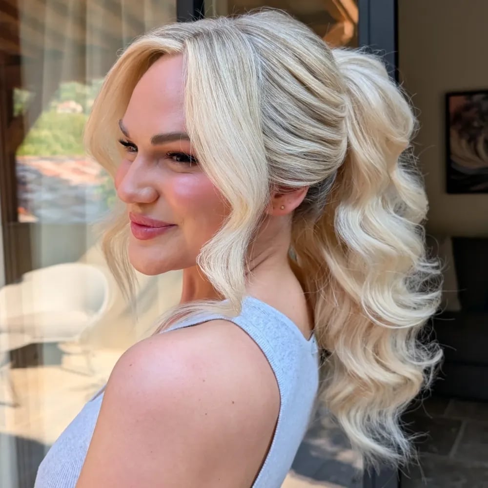 Platinum Blonde Ponytail With Swept Aside Bangs Platinum Blonde Ponytail With Swept Aside Bangs — Classy Blonde Ponytail