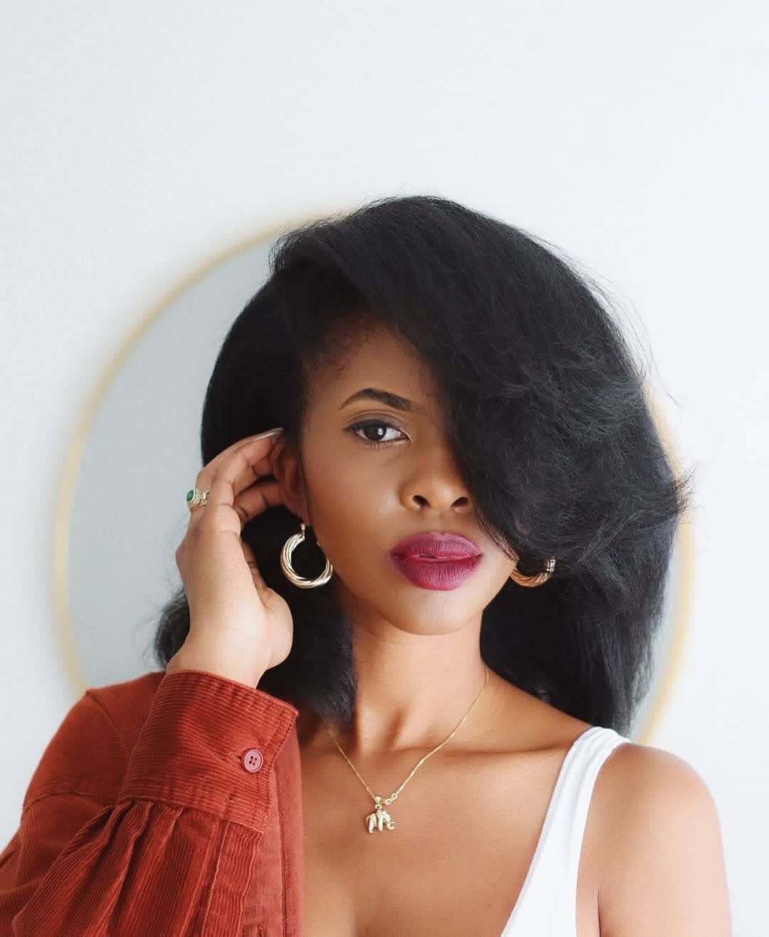 Voluminous Mid-Back Black Blowout — Classy Blowout Hairstyles Black Women