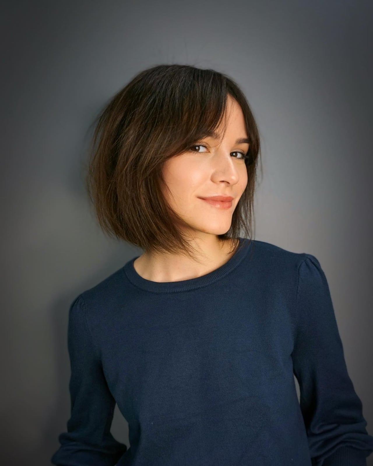 Chin Length Dark Brown Bob With Effortless Waves — Classy Bob with Curtain Bangs