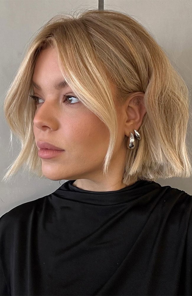 Collarbone Ash Blonde Bob With Tousled Styling — Classy Bob with Curtain Bangs