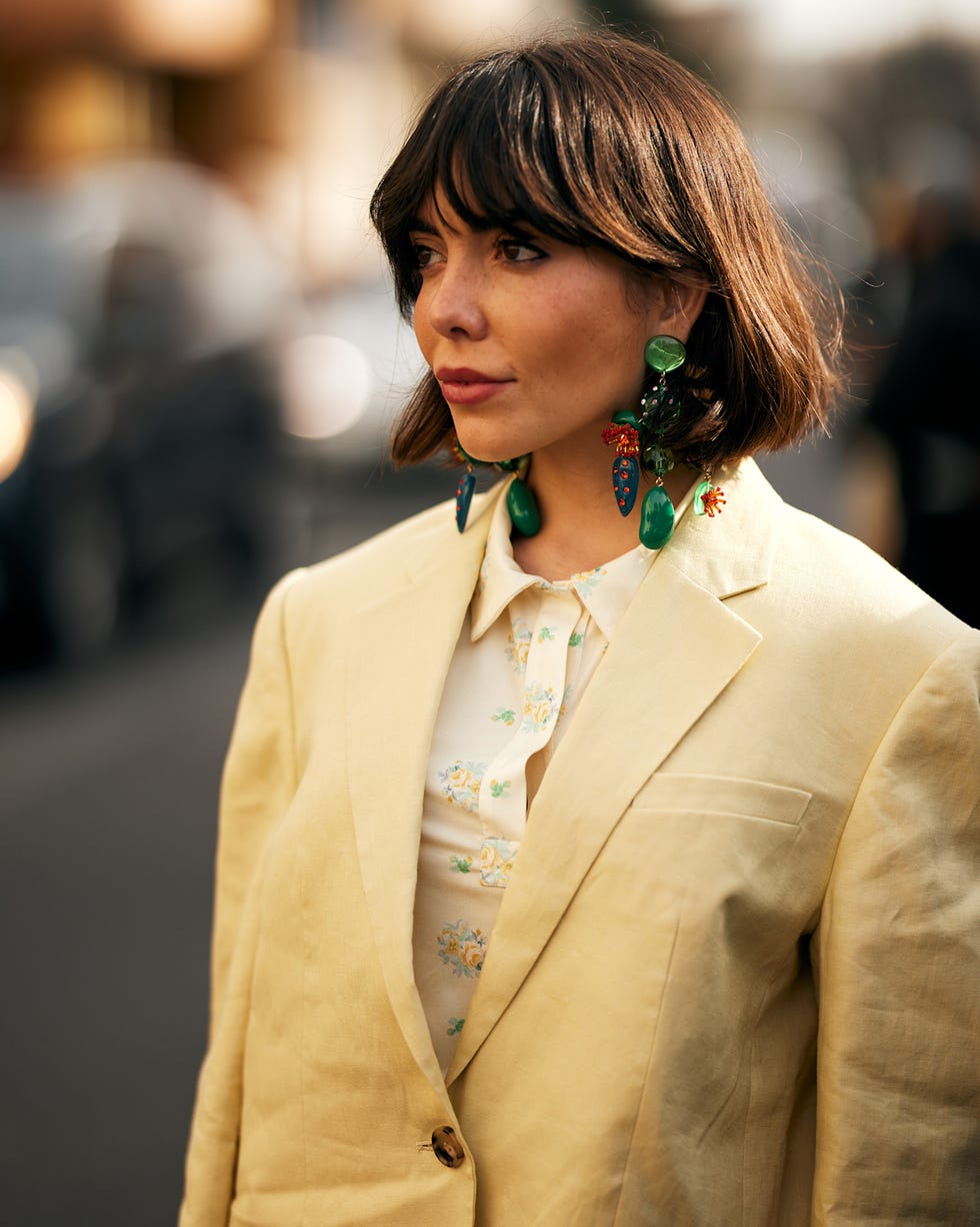 Chin Length Bob With Tousled Styling And Dark Brown Color — Classy Bob with Curtain Bangs