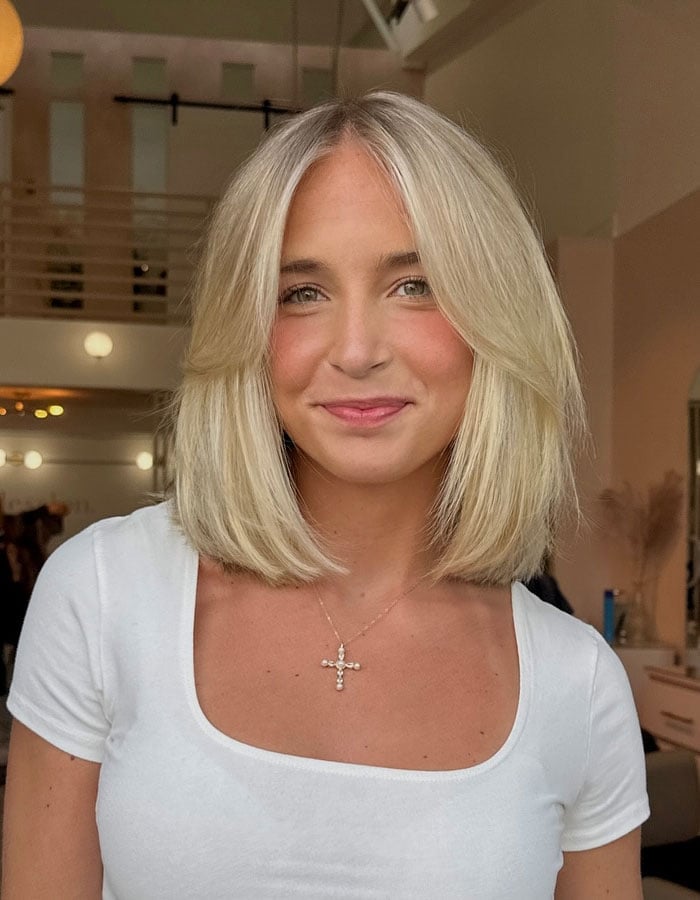 Sleek Platinum Blonde Bob With Curtain Bangs — Classy Bob with Curtain Bangs