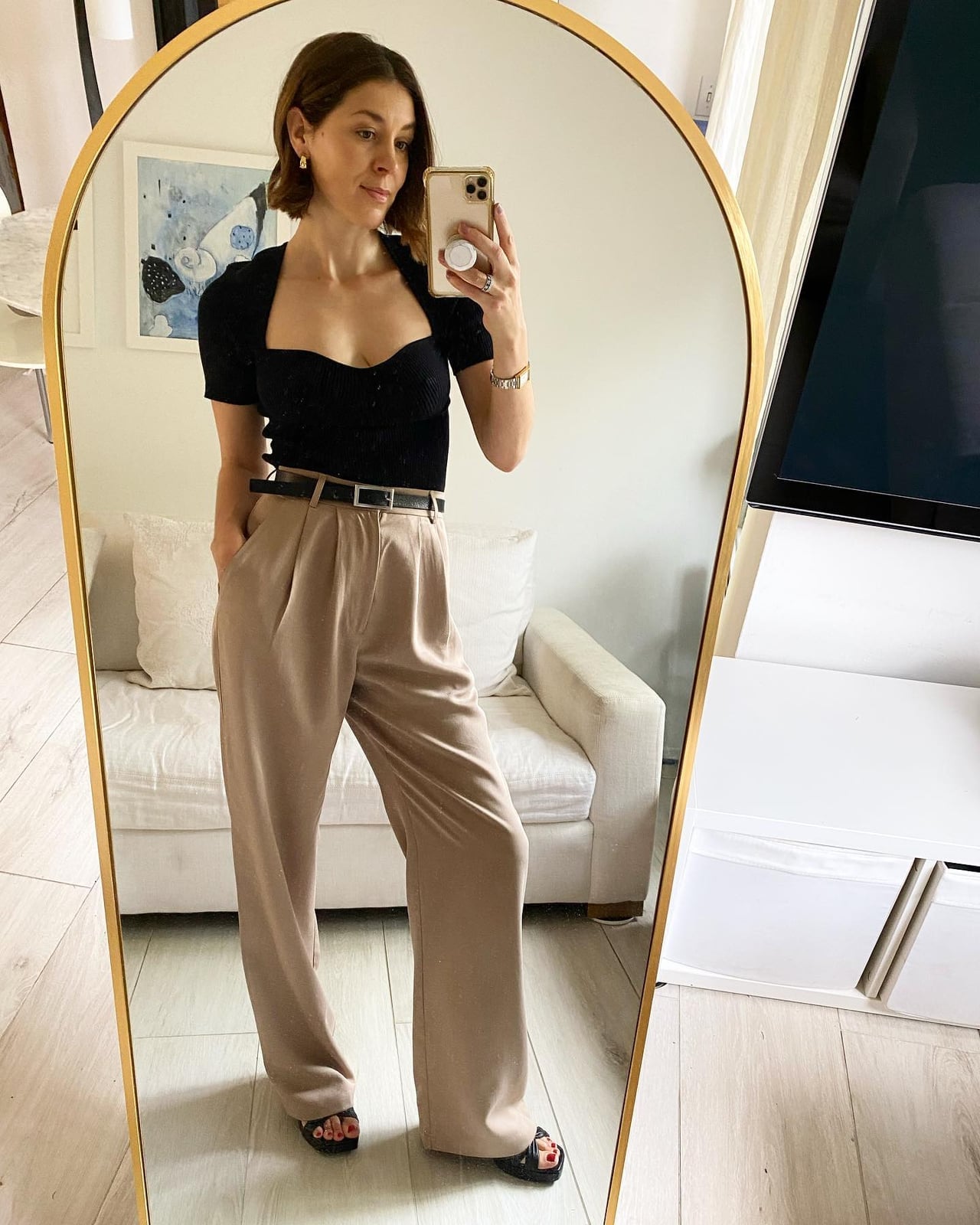 Black Short Sleeve Bodysuit with Beige Wide Leg, Close-Up Take — Classy Bodysuit Outfits