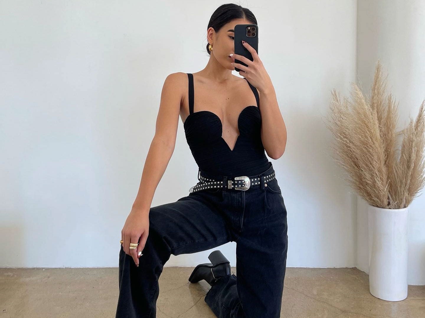 Black Plunging Neckline Bodysuit with Grey Jeans — Classy Bodysuit Outfits