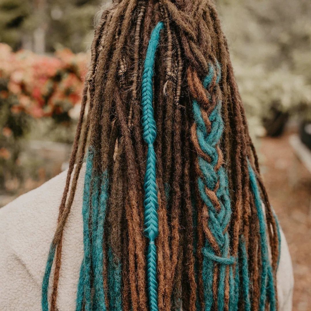 Mid-Back Locs With Teal Braided Accents Mid-Back Locs With Teal Braided Accents — Classy Braids Locs