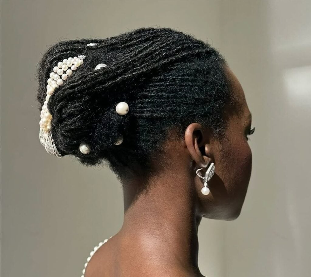 Elegant Locs Updo With Pearl Embellishments Elegant Locs Updo With Pearl Embellishments — Classy Braids Locs
