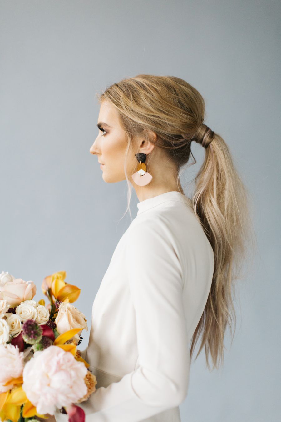 Ash Blonde Long Ponytail With Side-Swept Bangs — Classy Bridesmaid Ponytail