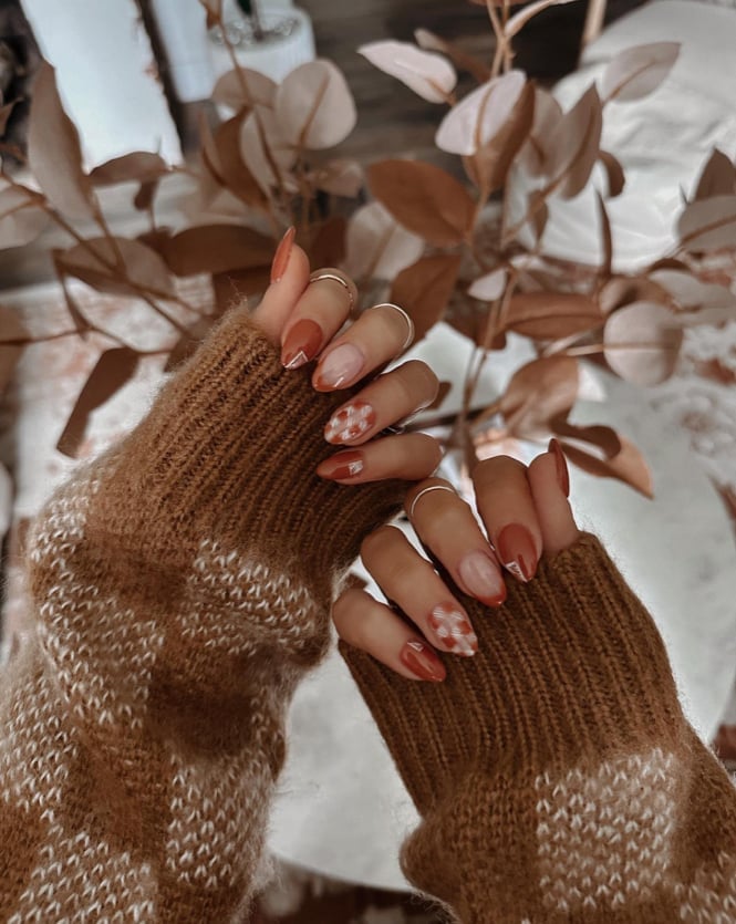 Burnt Orange Almond Nails with White Floral Design Burnt Orange Almond Nails with White Floral Design — Classy Brown Almond Nails