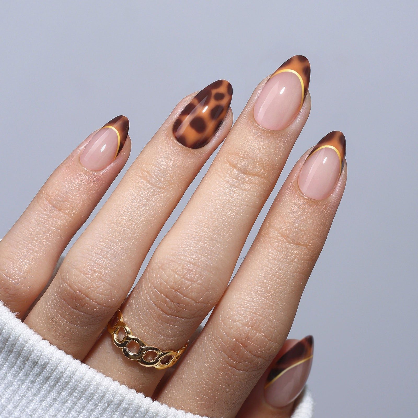 Long Almond French Tip with Gold Outline Long Almond French Tip with Gold Outline — Classy Brown Almond Nails