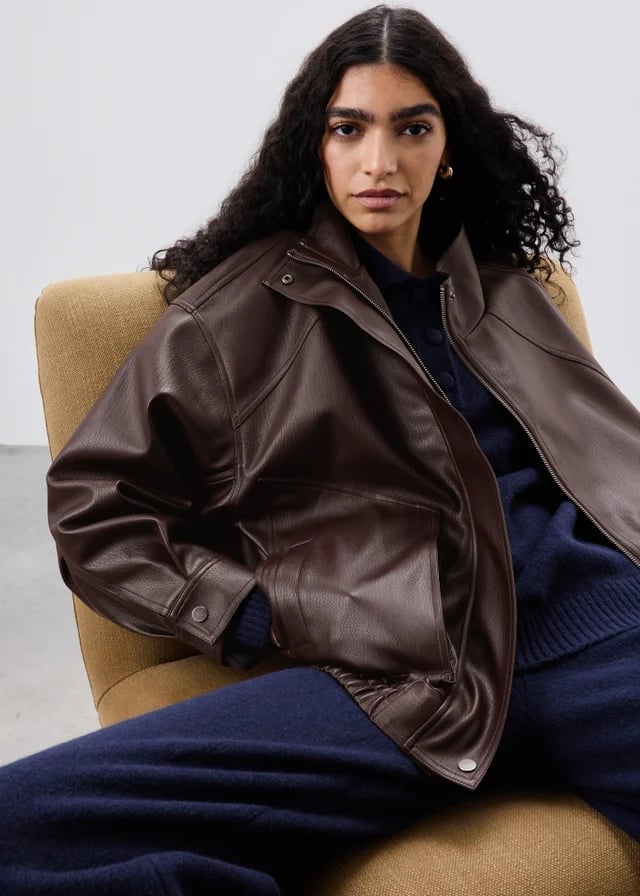 Relaxed Brown Faux Leather Jacket Navy Cardigan, Close-Up Take — Classy Brown Leather Jacket Outfit