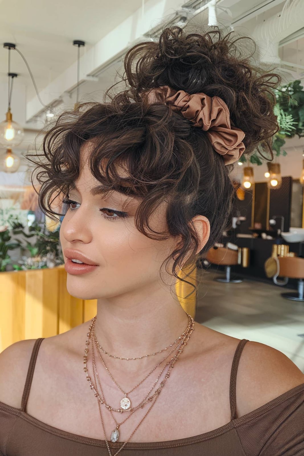 High Messy Bun With Curly Bangs High Messy Bun With Curly Bangs — Classy Bun and Bang
