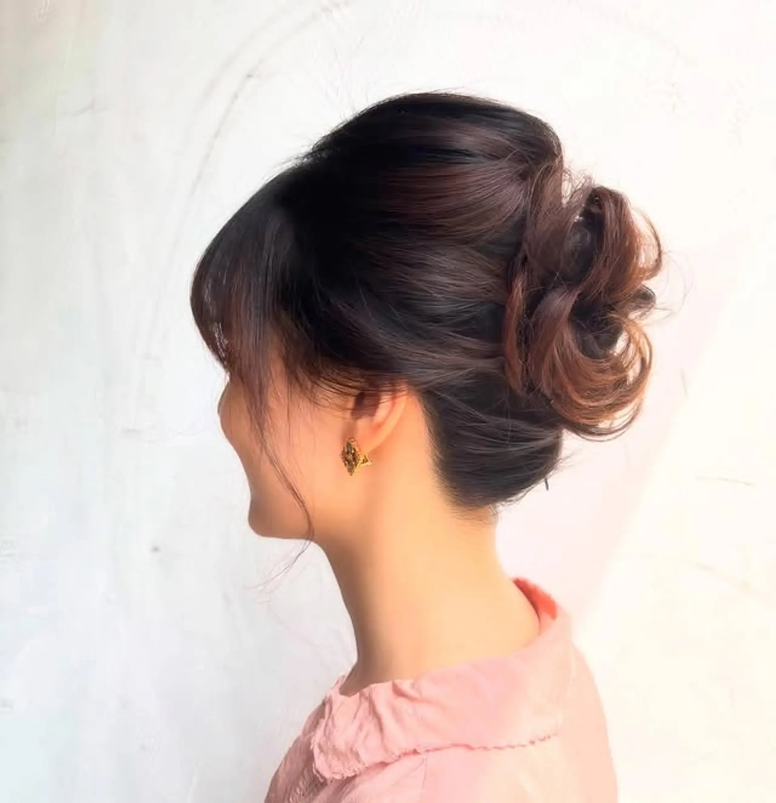 Soft Low Bun With Curled Face-Framing Pieces Soft Low Bun With Curled Face-Framing Pieces — Classy Bun and Bang