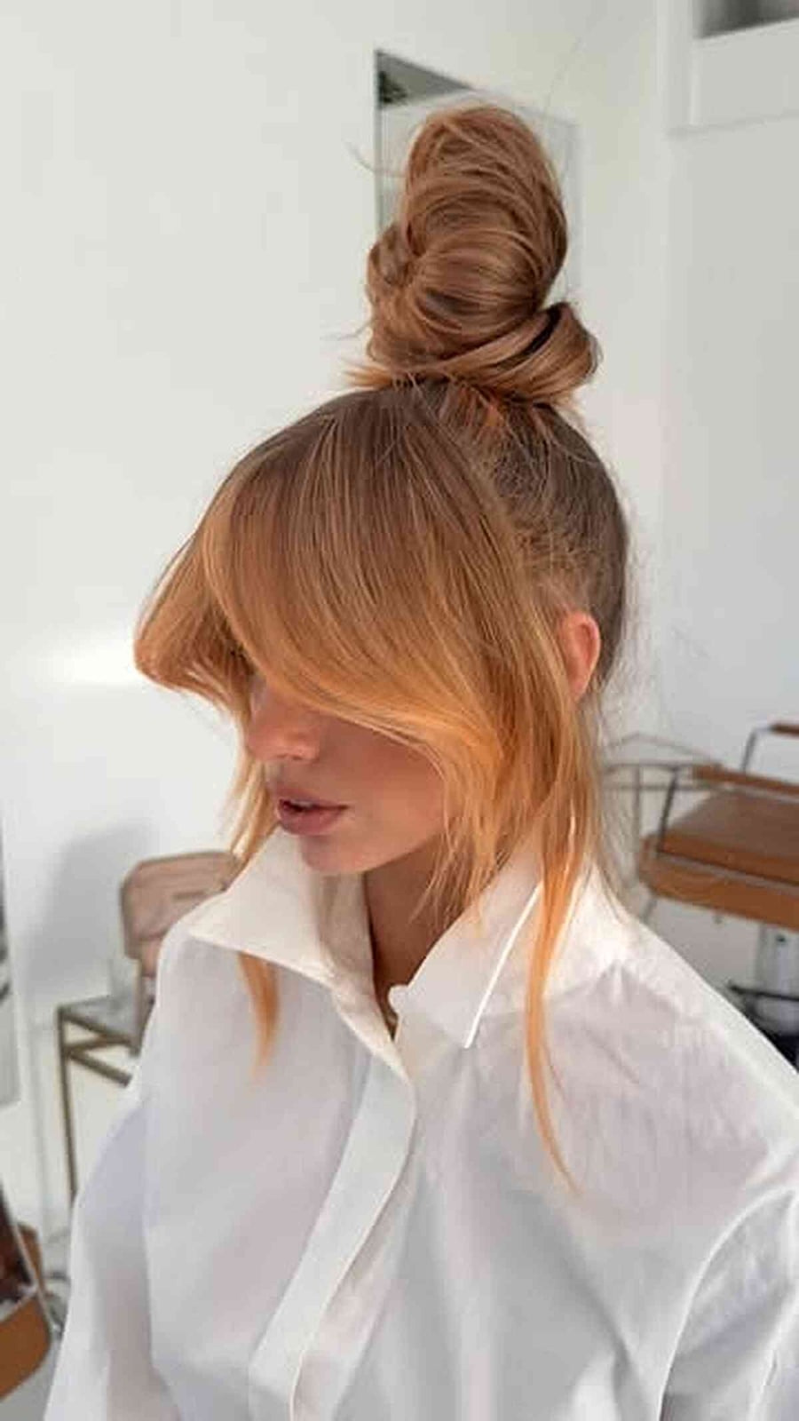Blonde Bun With Balayage And Blunt Bangs Blonde Bun With Balayage And Blunt Bangs — Classy Bun and Bang