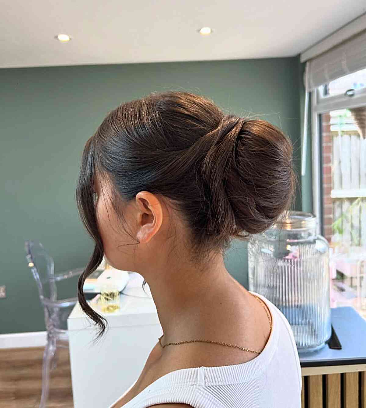 Sleek Low Bun With Wispy Bangs, Mid-Back Sleek Low Bun With Wispy Bangs, Mid-Back — Classy Bun and Bang