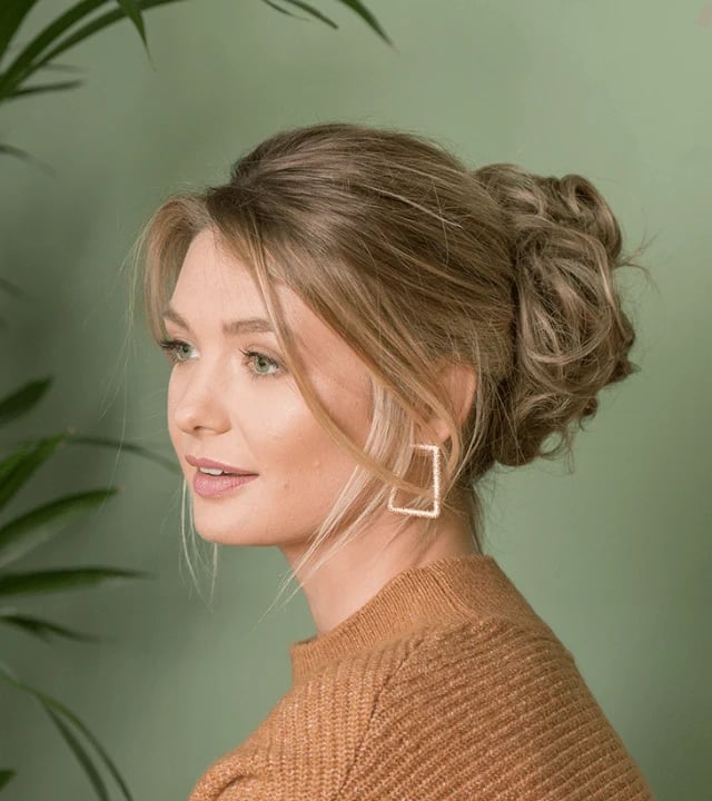 Ash Blonde Loose Low Bun With Curtain Bangs Ash Blonde Loose Low Bun With Curtain Bangs — Classy Bun and Bang