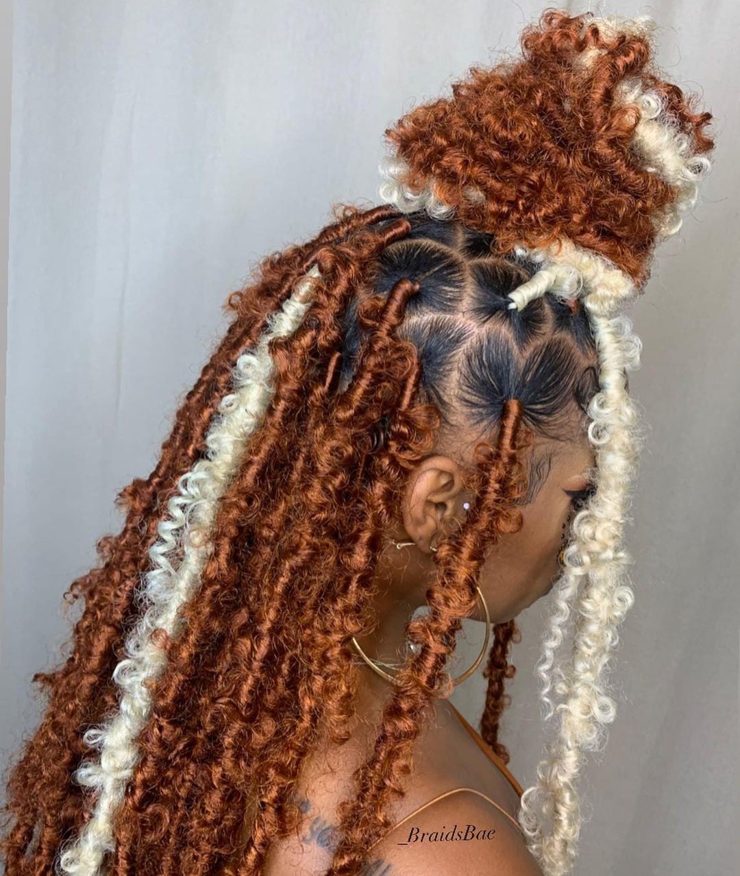 Mid-Back Bun With Cascading Locs Mid-Back Bun With Cascading Locs — Classy Butterfly Locs