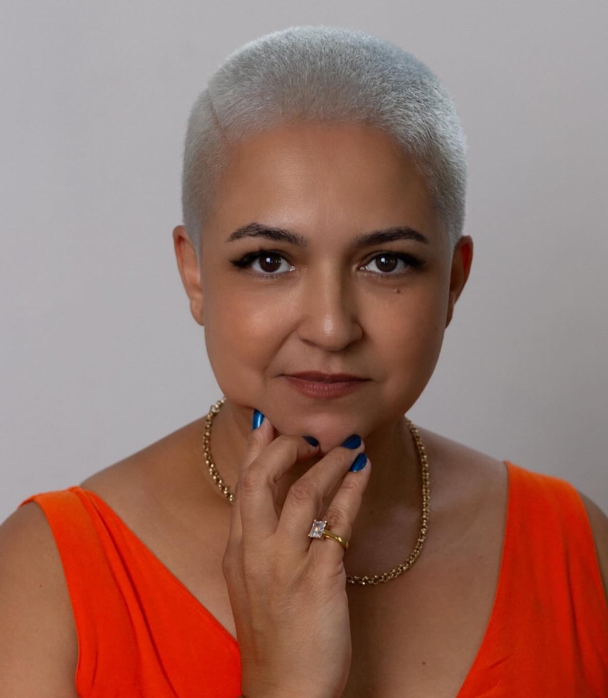 Silver Buzz Cut with Orange Sleeveless Top — Classy Buzz Cut