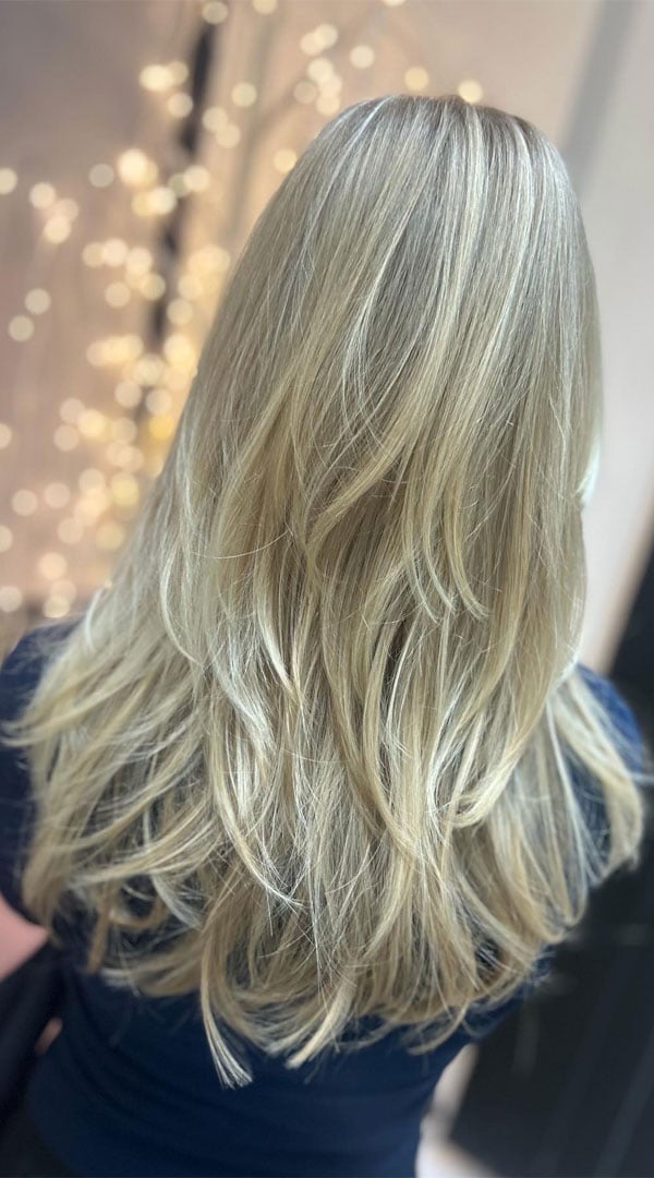 Blonde Mid-Back Layers With Wavy Texture Blonde Mid-Back Layers With Wavy Texture — Classy Choppy Layers