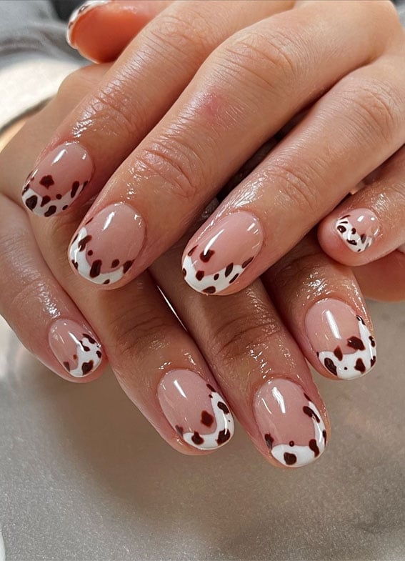 Brown and White Cow Print French Tips Short Almonds, Close-Up Take — Classy Cow Print Nails