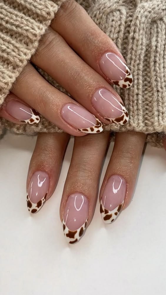 Brown and White Cow Print French Tips on Almonds — Classy Cow Print Nails