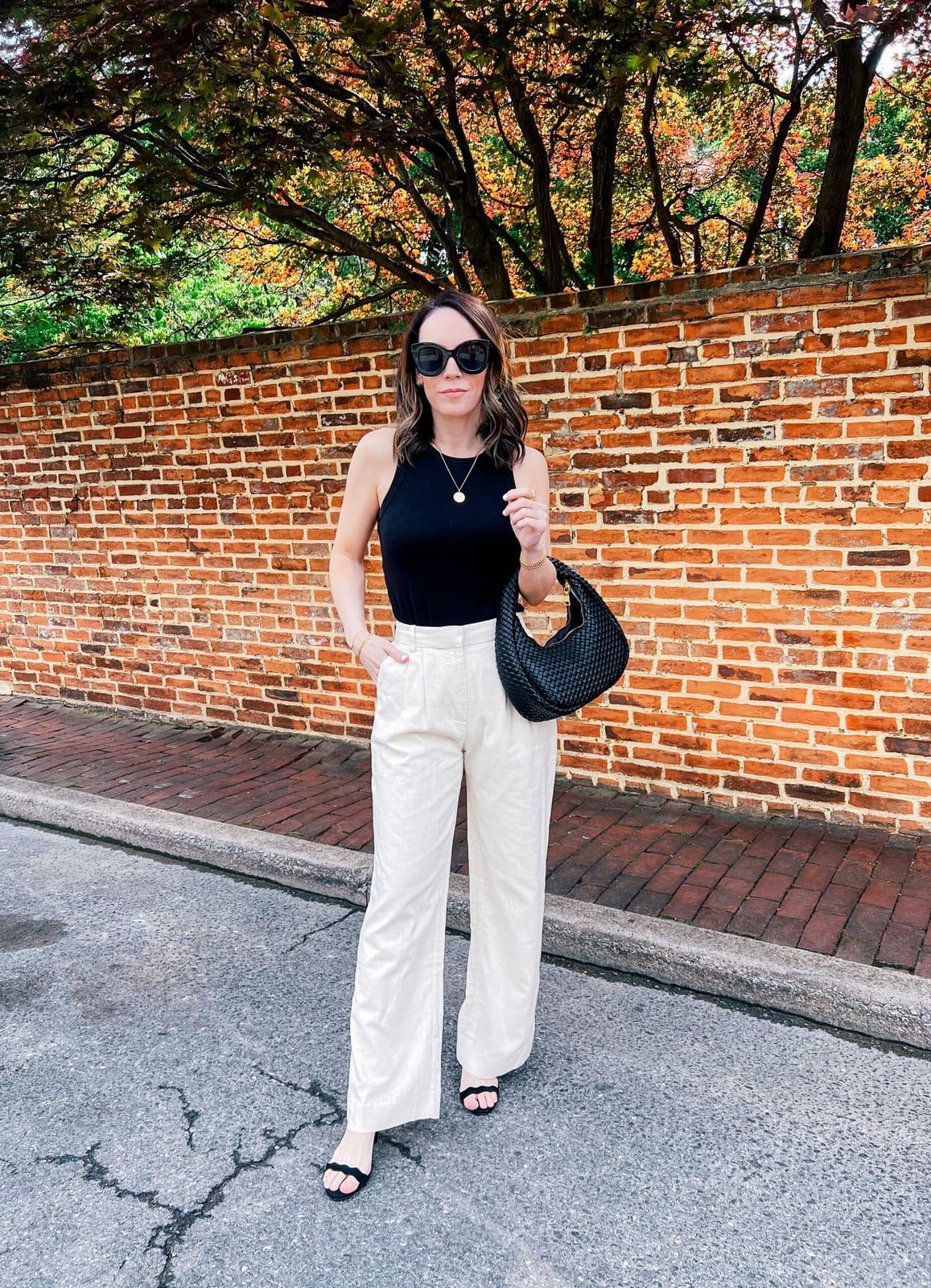 Cream Wide Leg Pants With Black Sleeveless Top Cream Wide Leg Pants With Black Sleeveless Top — Classy Cream Pants Outfits
