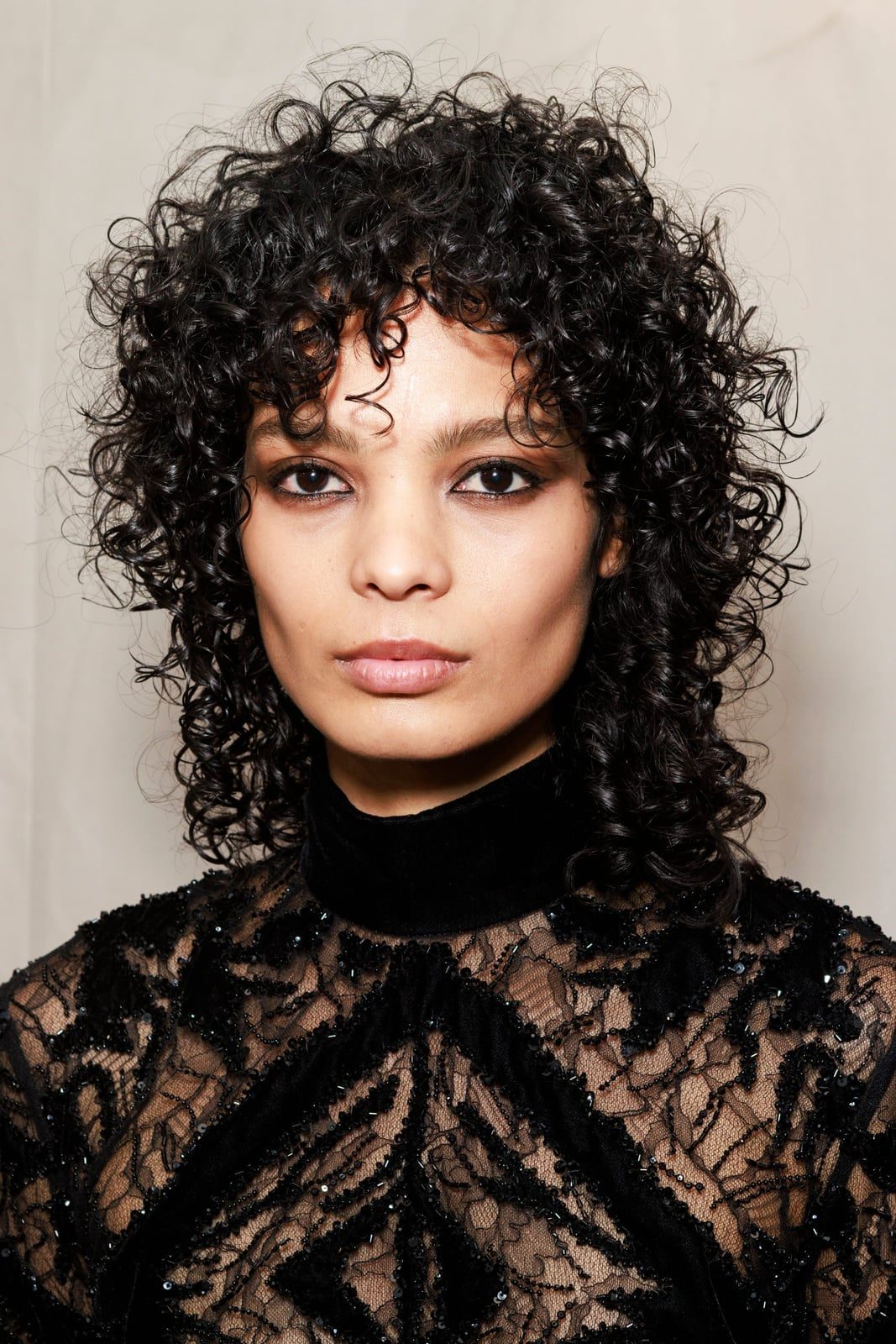 Collarbone Shag With Subtle Highlights — Classy Curly Hair Cutting