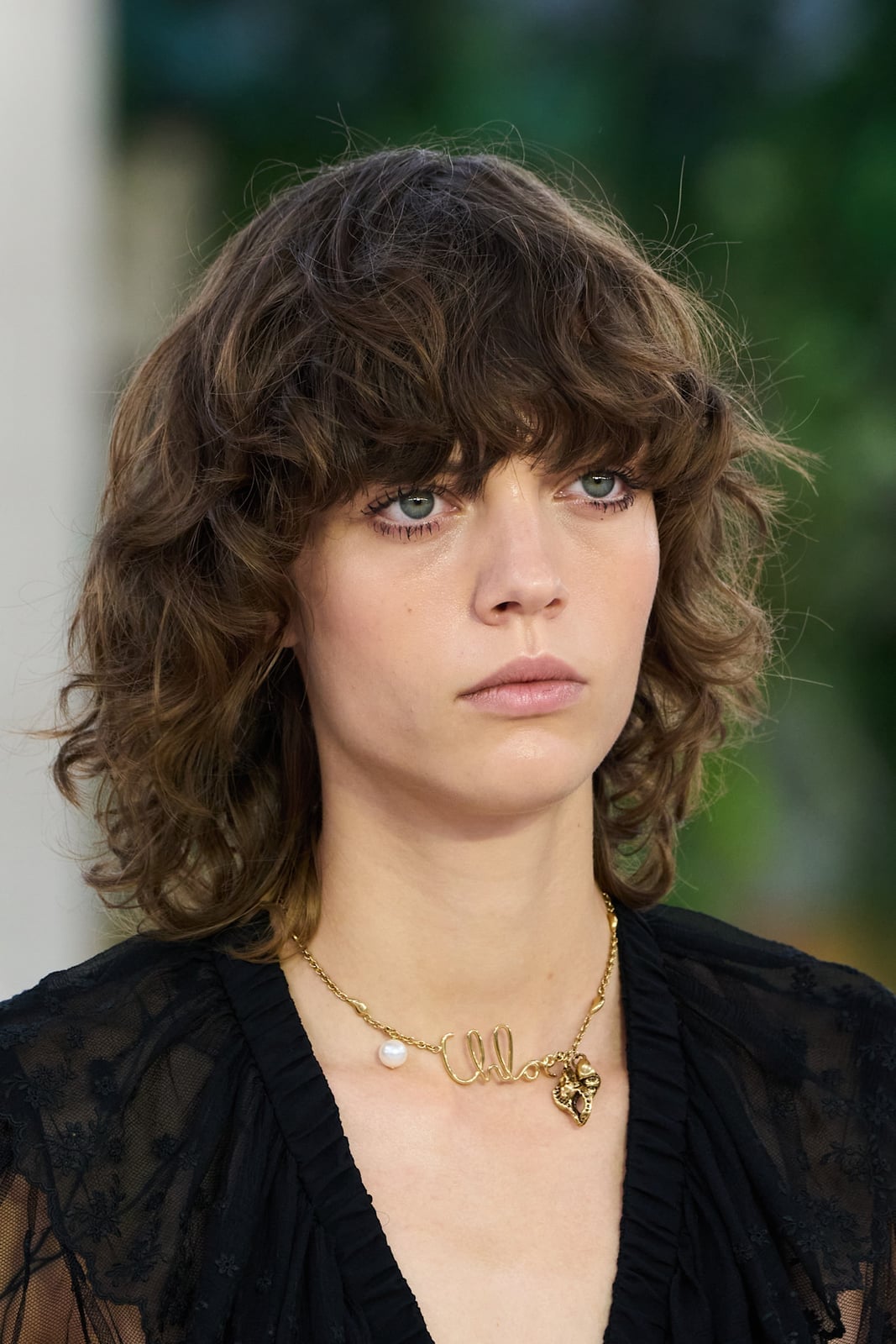 Collarbone Bob With Middle Part — Classy Curly Haircuts