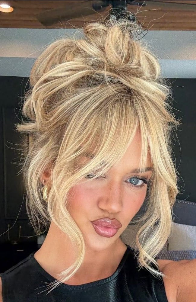 Long Blonde Messy Bun With Curtain Bangs Long Blonde Messy Bun With Curtain Bangs — Classy Curtain Bangs