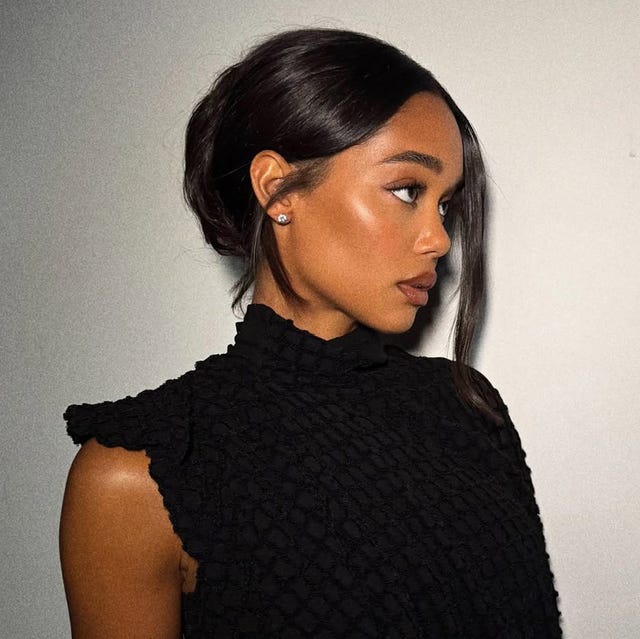 Sleek Dark Brown Low Bun With Wispy Bangs — Classy Dance Hairstyles