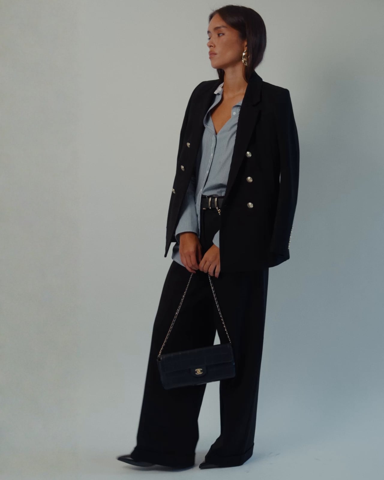 Black Oversized Blazer with Striped Shirt and Wide Leg Trousers Black Oversized Blazer with Striped Shirt and Wide Leg Trousers — Classy Errands Outfits