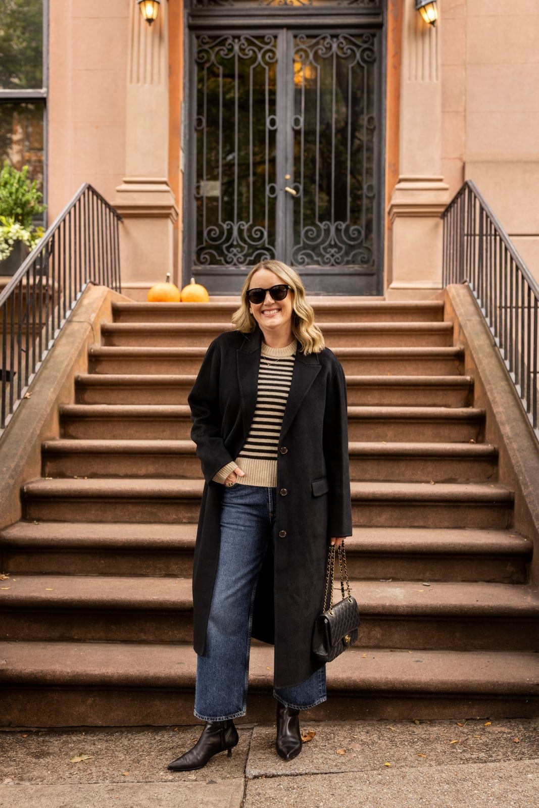 Long Black Coat Over Striped Sweater and Wide Leg Jeans Long Black Coat Over Striped Sweater and Wide Leg Jeans — Classy Errands Outfits
