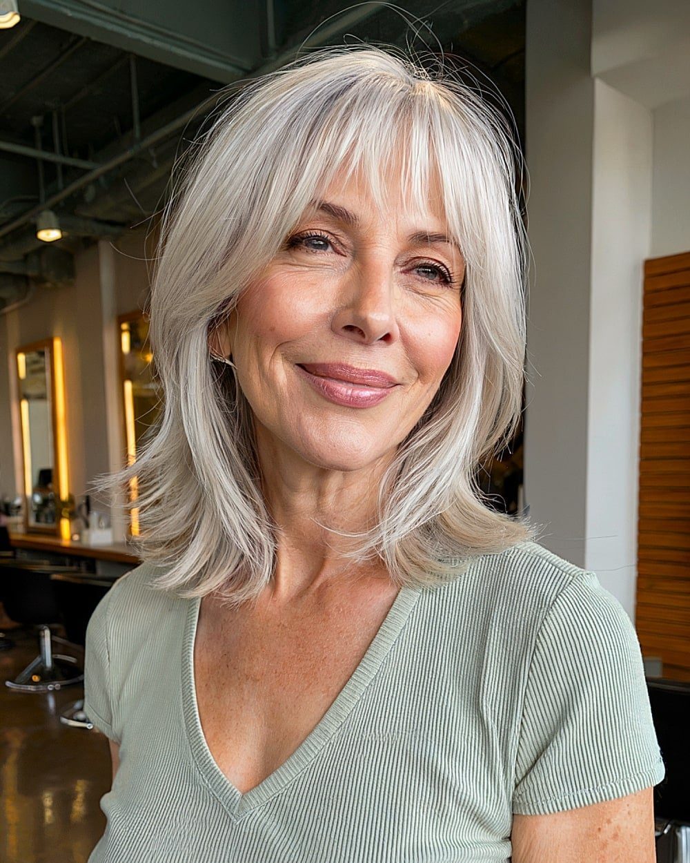 Collarbone Silver Grey Hair With Wispy Bangs Collarbone Silver Grey Hair With Wispy Bangs — Classy Face Framing Layers
