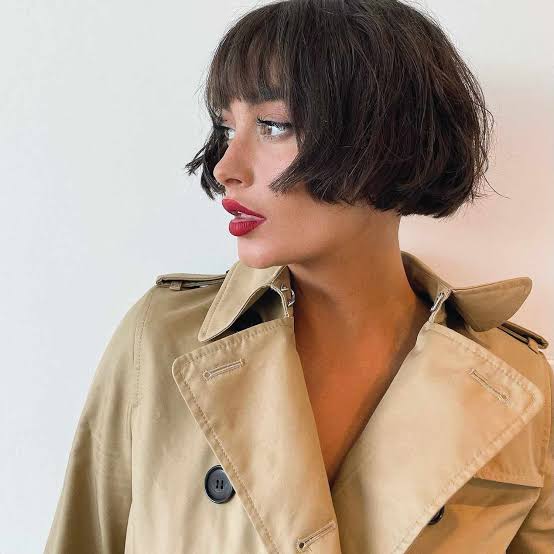 Layered Chin Bob With Wispy Bangs Layered Chin Bob With Wispy Bangs — Classy French Bob with Bangs
