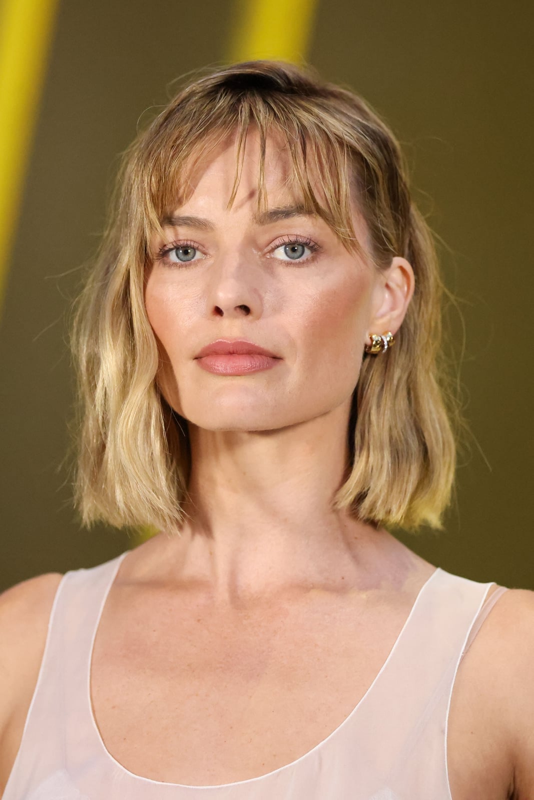 Ash Blonde Collarbone Bob With Curtain Bangs Ash Blonde Collarbone Bob With Curtain Bangs — Classy French Bob with Bangs