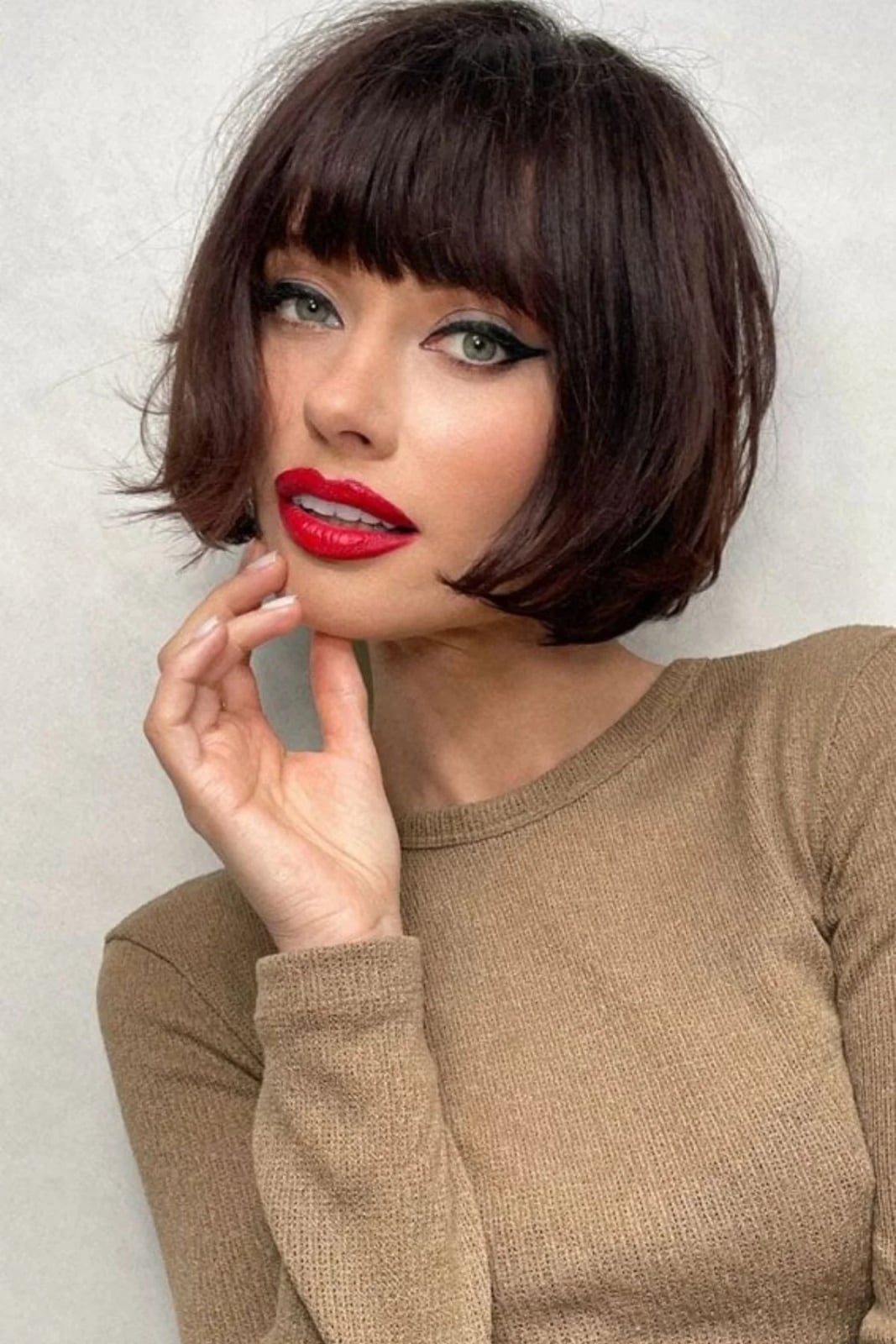 Sharp Ear-Length Bob With Blunt Fringe Sharp Ear-Length Bob With Blunt Fringe — Classy French Bob with Bangs