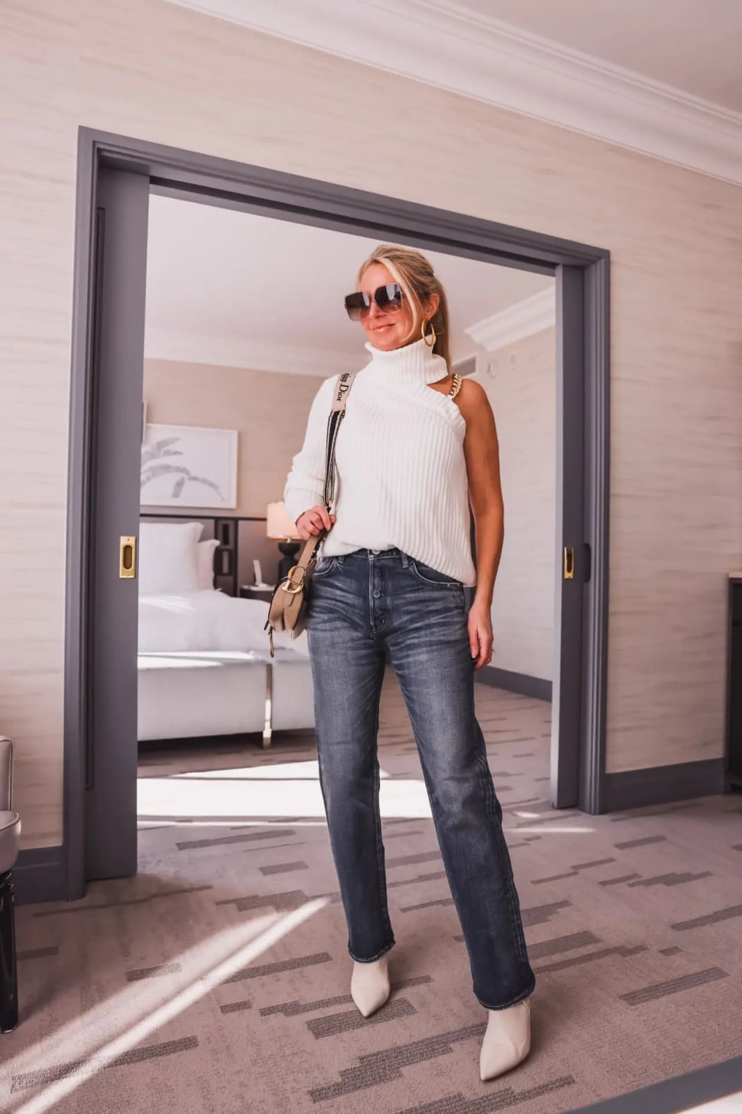 Cut-Out Sweater Adds Detail to Grey Jeans — Classy Gray Jeans Outfits