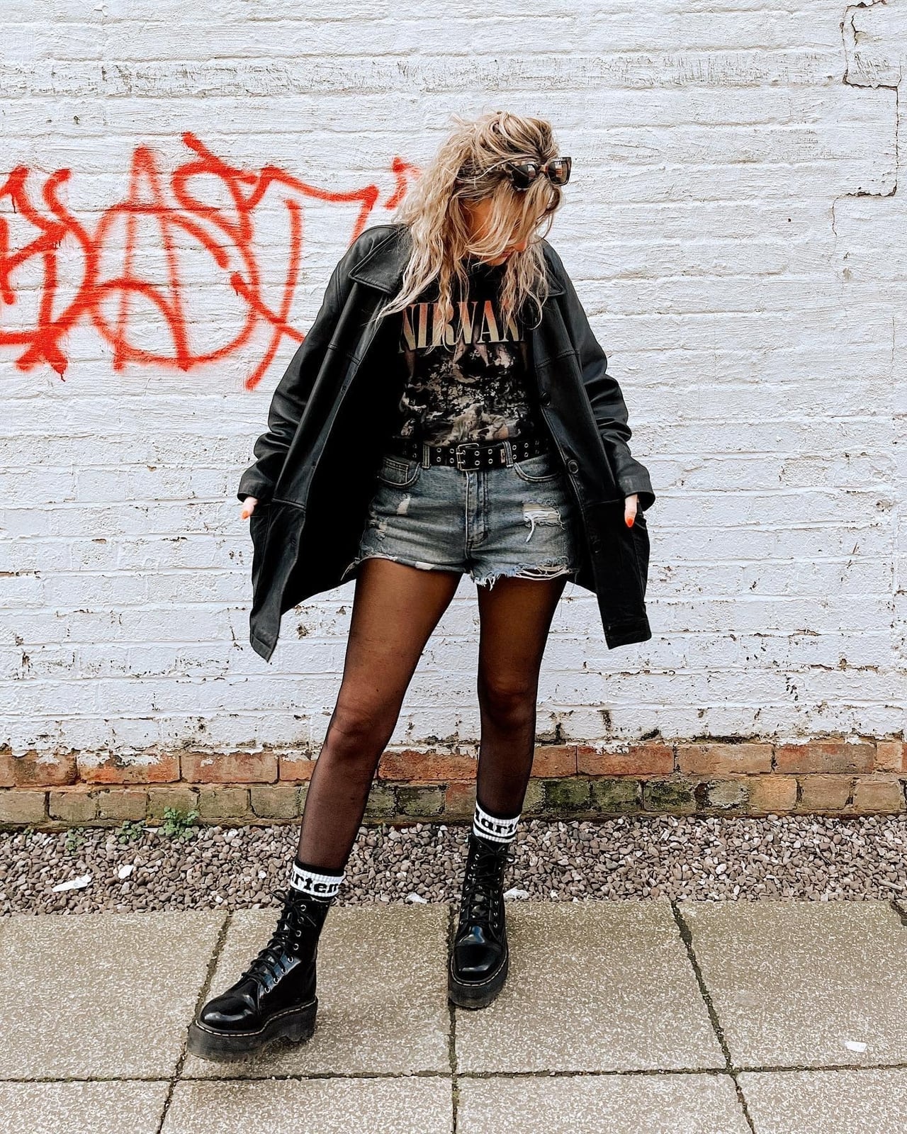 Leather Trench Coat Over Graphic Tee and Ripped Shorts Leather Trench Coat Over Graphic Tee and Ripped Shorts — Classy Grunge Style