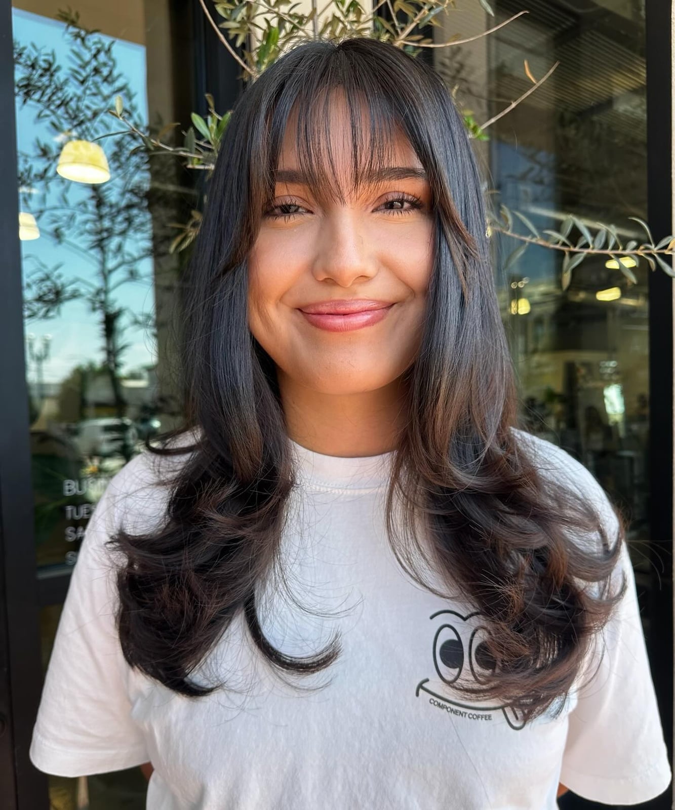 Mid-Back Layers With Wispy Bangs — Classy Hair with Bangs