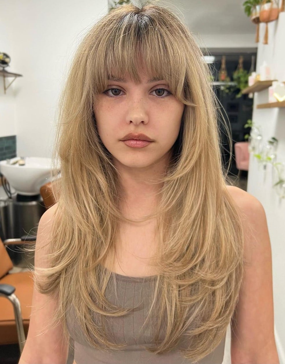 Mid-Back Layers With Ash Blonde Balayage — Classy Hair with Bangs