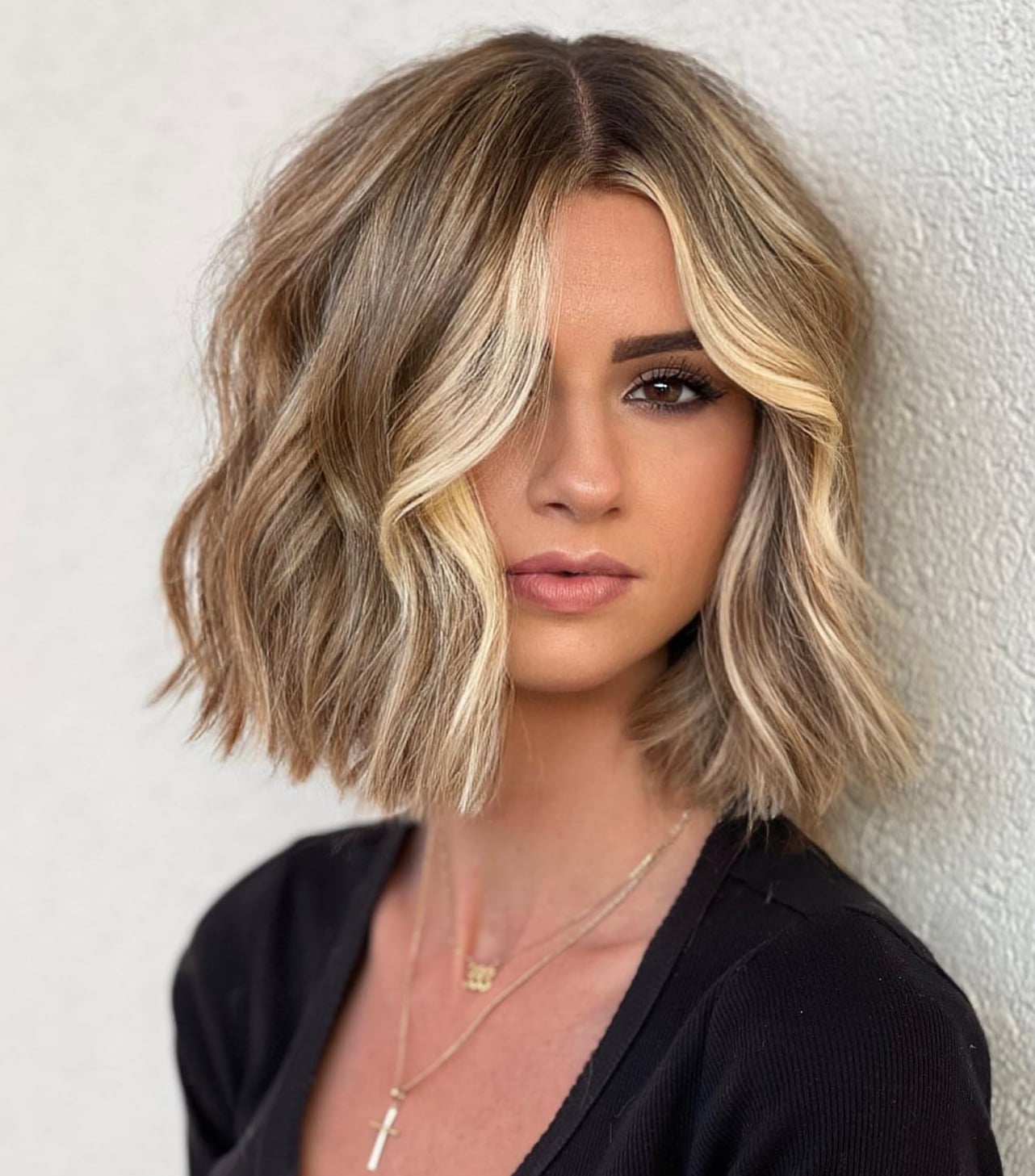 Angled Bob With Side Swept Bangs — Classy Haircuts for Round Face