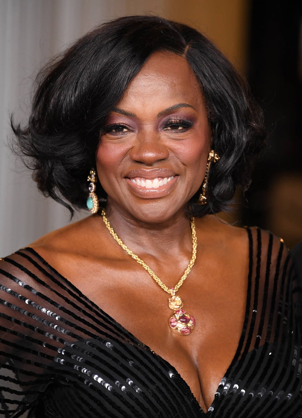 Chin Length Layered Bob With Side-Swept Bangs — Classy Haircuts for Women over 50