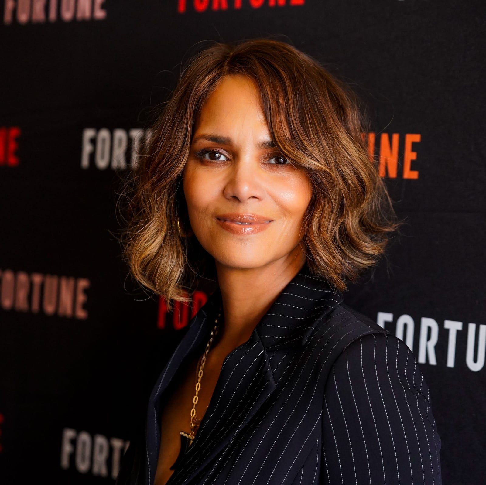 Glossy Brunette Lob With Soft Blowout — Classy Hairstyles for Women over 50
