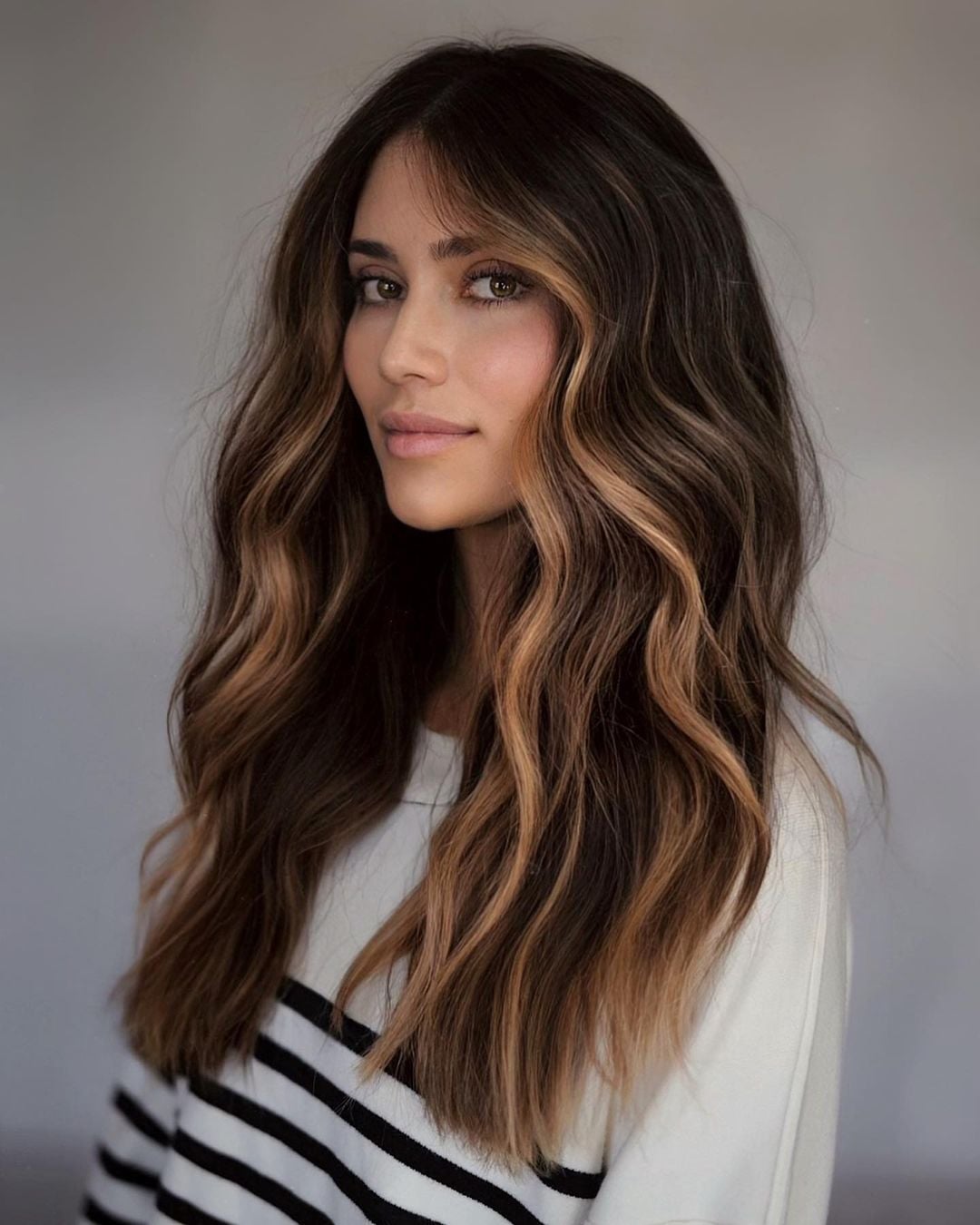 Mid-Back Layers With Caramel Face-Framing Pieces — Classy Highlights on Dark Brown