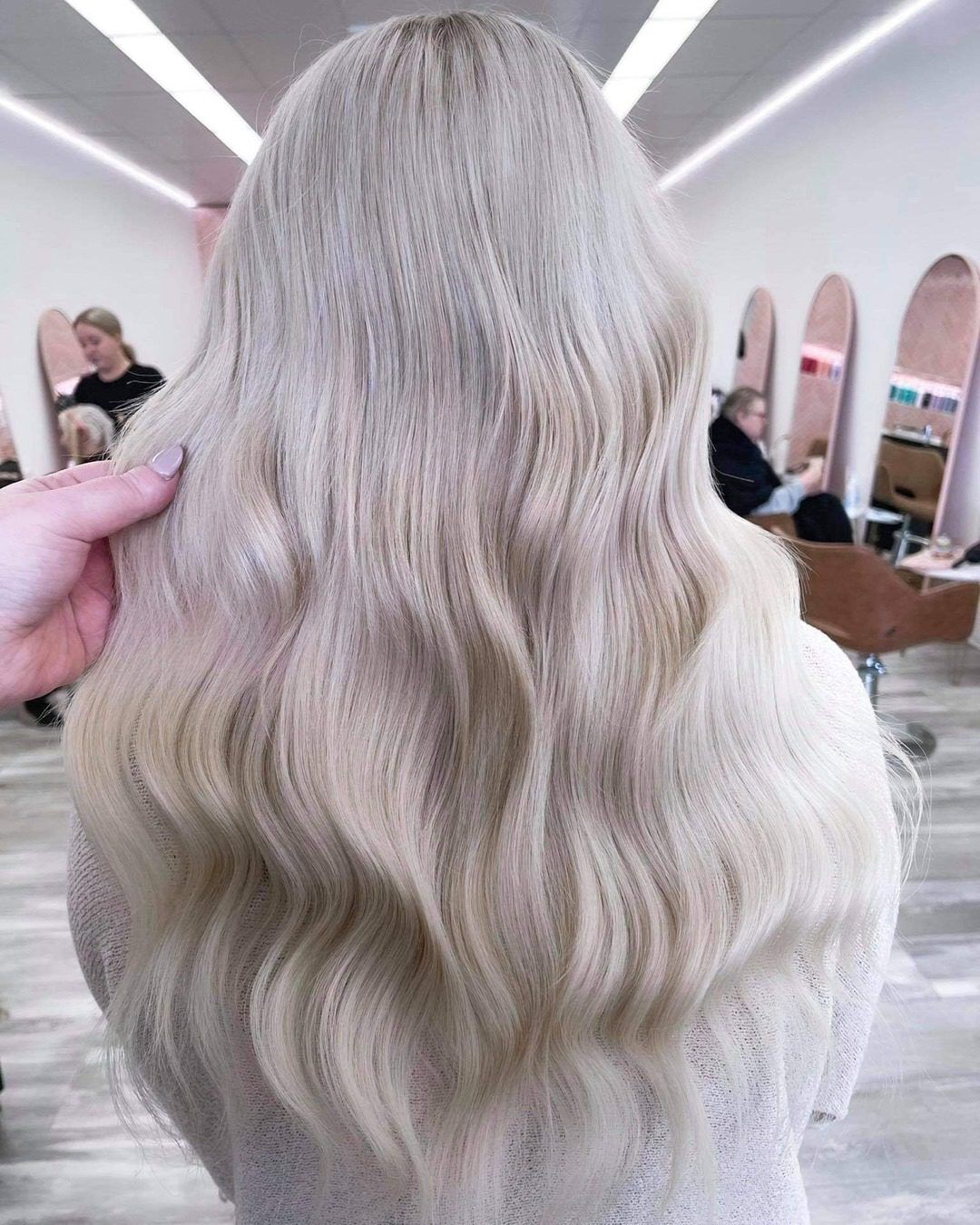 Mid-Back Platinum Blonde With Ash Undertones and Curtain Bangs — Classy Icy Blonde Hair