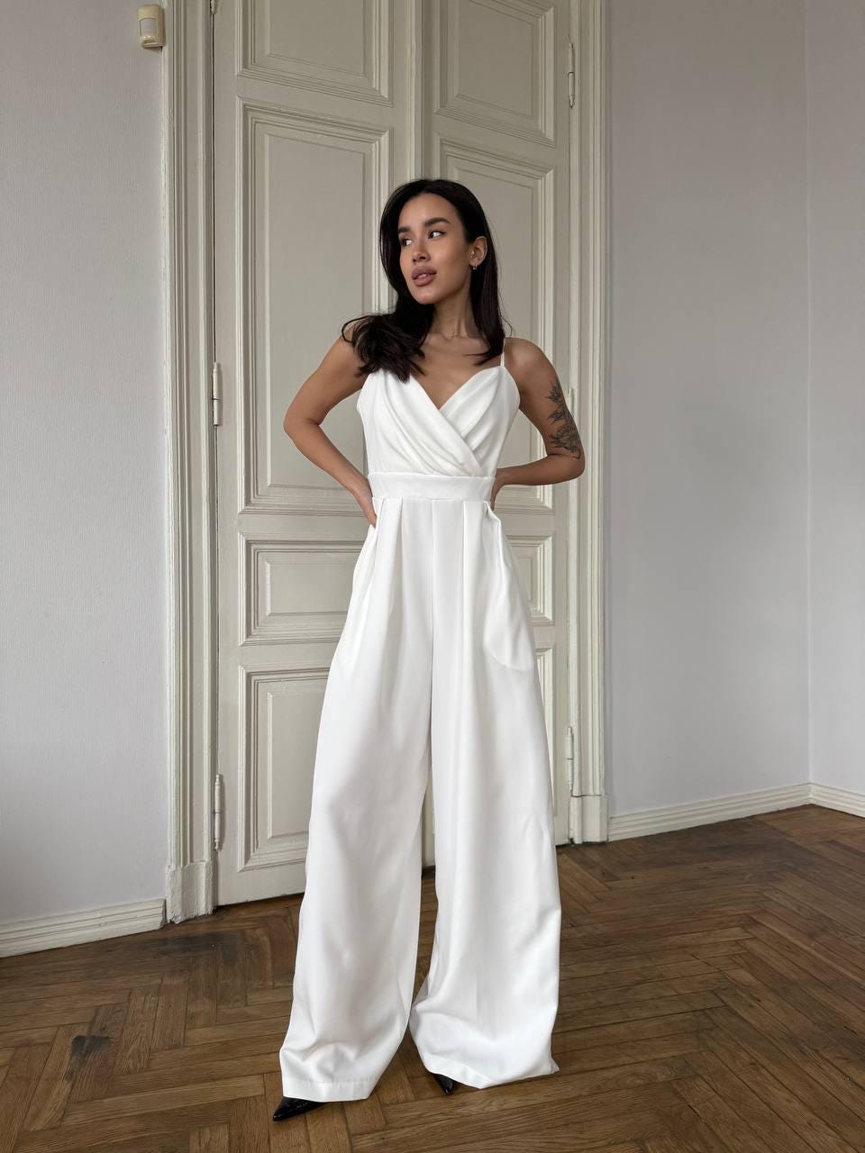 White Sleeveless Wide Leg Jumpsuit with V-Neck and Pointed Toe Heels White Sleeveless Wide Leg Jumpsuit with V-Neck and Pointed Toe Heels — Classy Jumpsuit Outfits