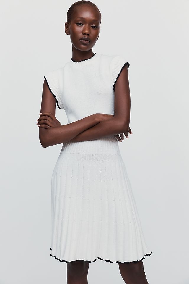 White Sleeveless Knit Dress with Black Trim White Sleeveless Knit Dress with Black Trim — Classy Knit Dress