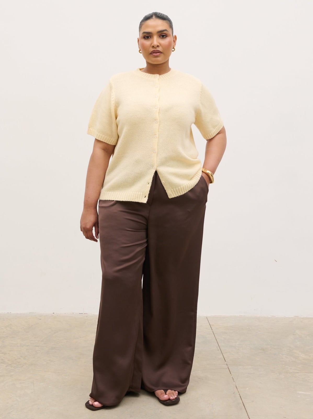 Pale Yellow Button-Up Knit Top With Wide-Leg Trousers Pale Yellow Button-Up Knit Top With Wide-Leg Trousers — Classy Knit Outfits