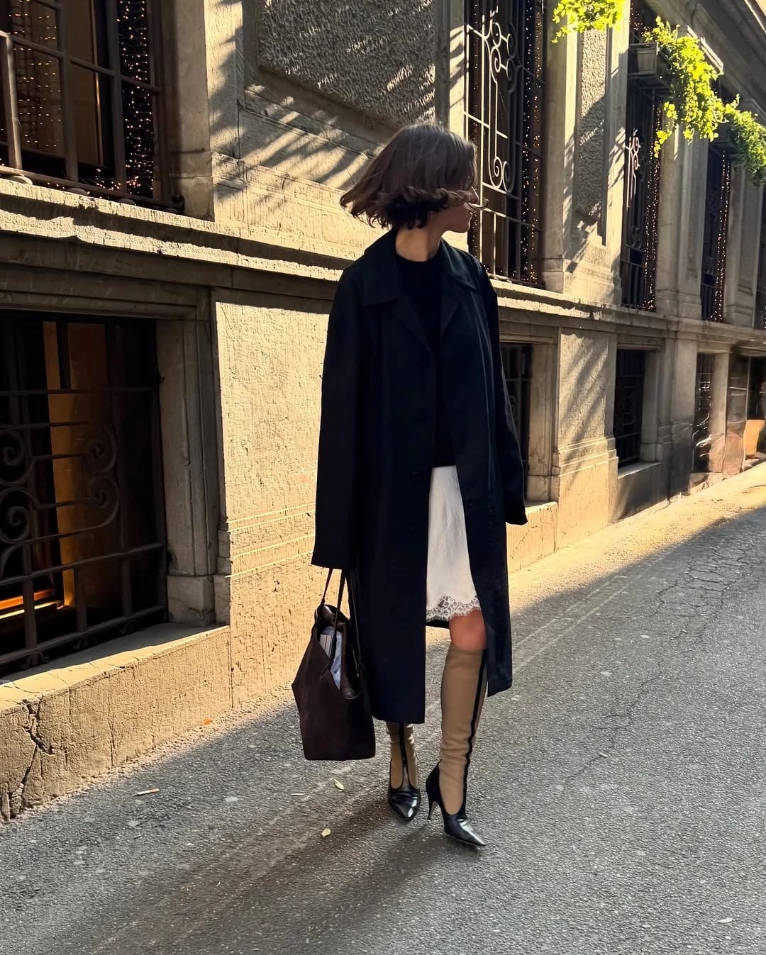 White Lace Skirt Under Black Trench Coat — Classy Lace Skirt Outfit